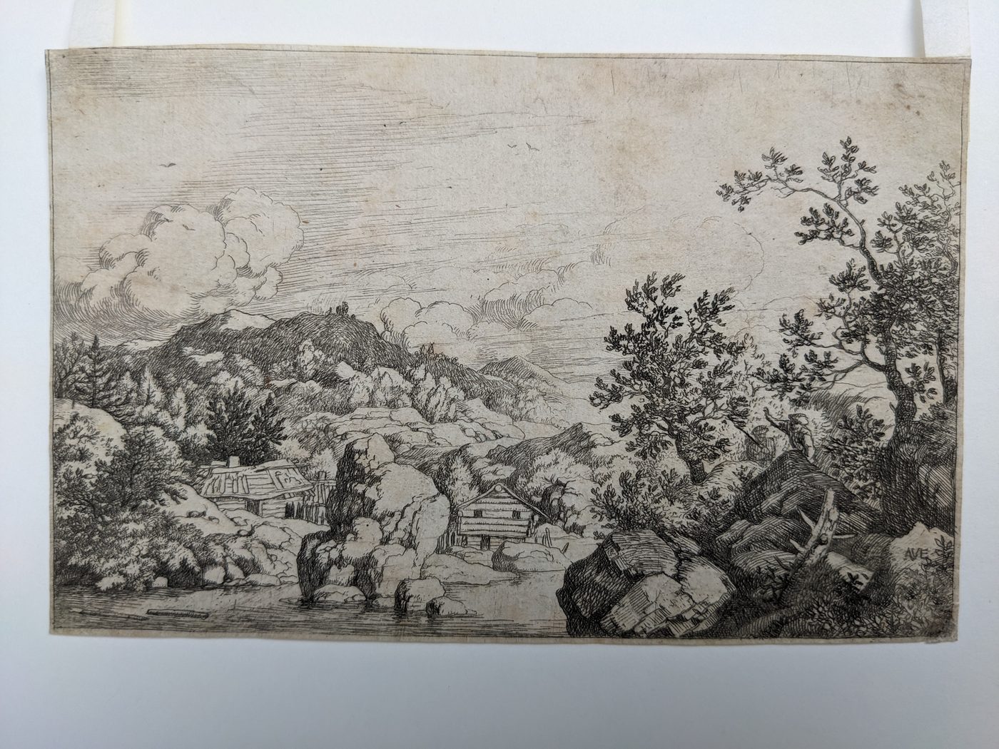 “The large rock projecting from a river”