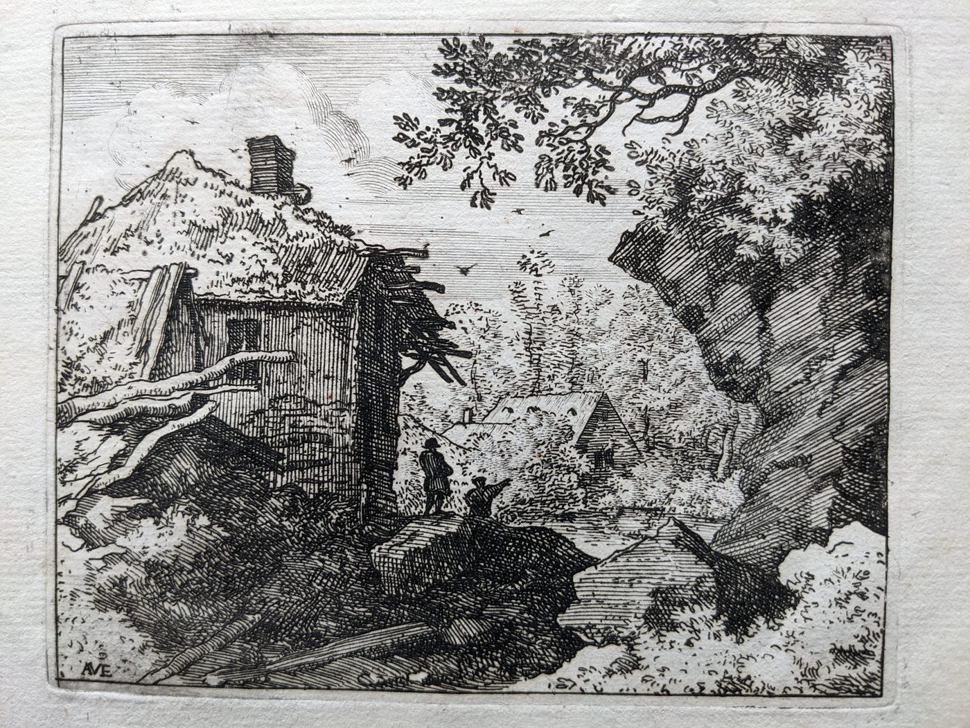 “The straw hut seen from behind”