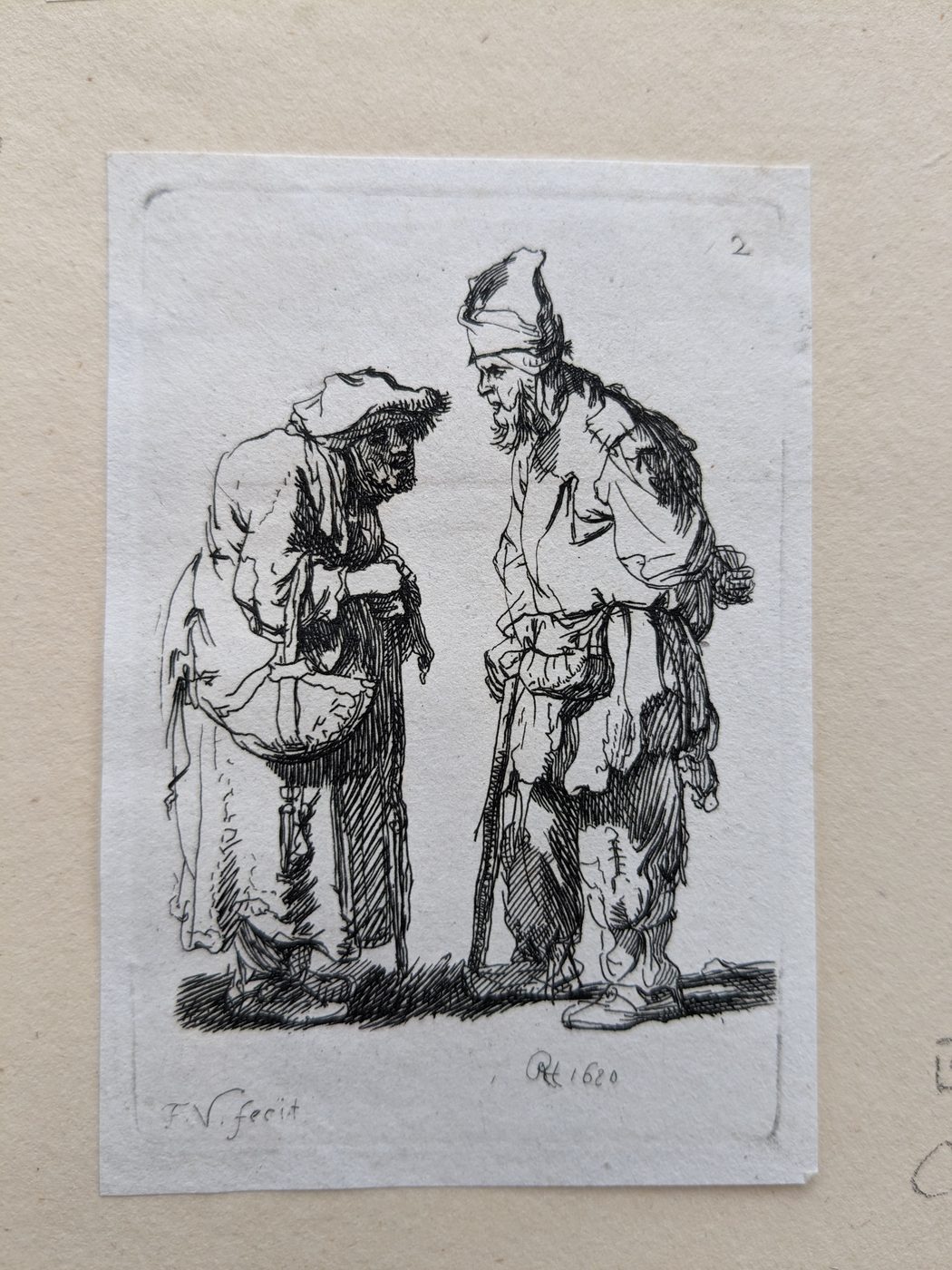 “Beggar man and beggar woman conversing”