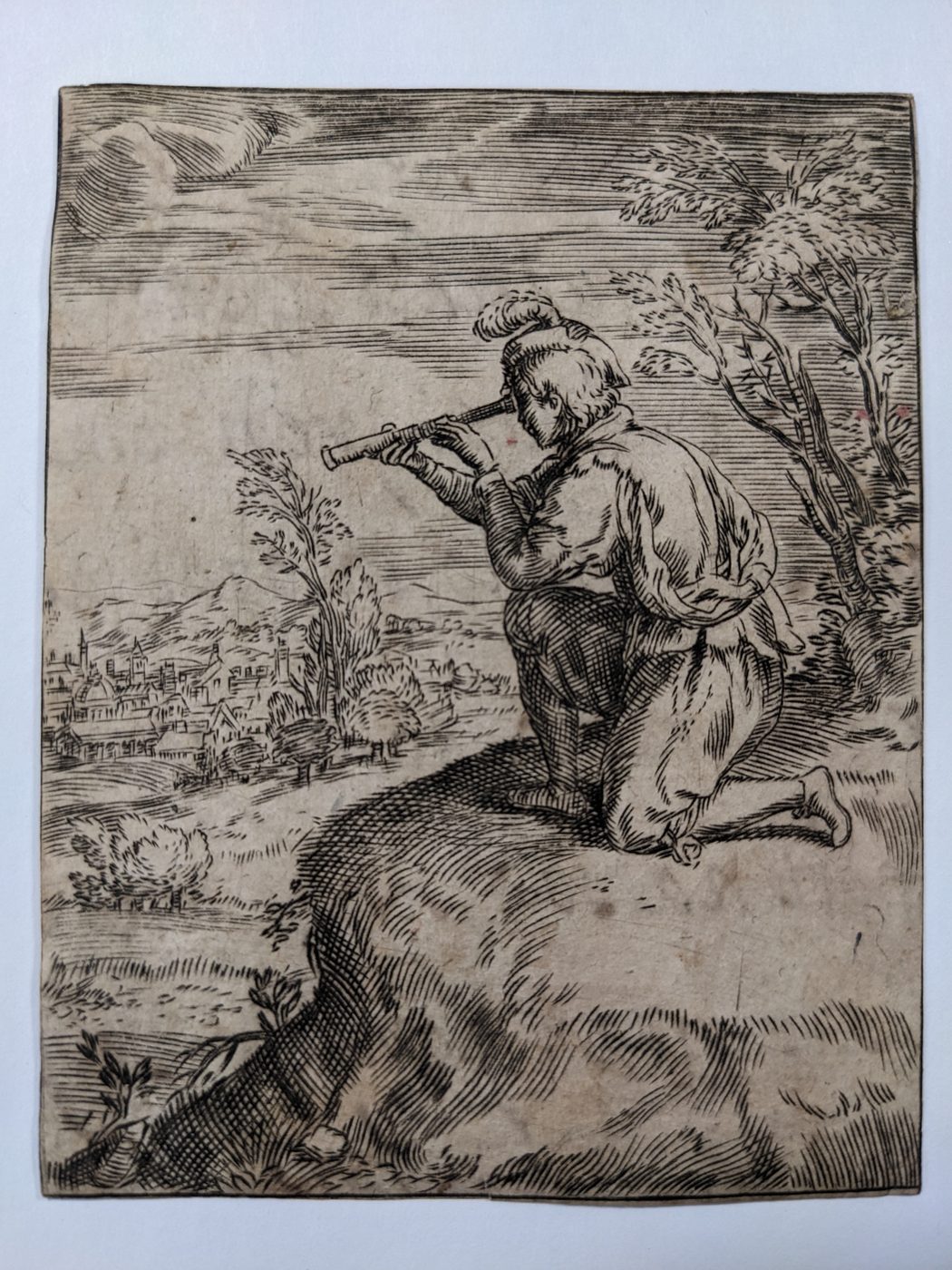 Man using a spyglass