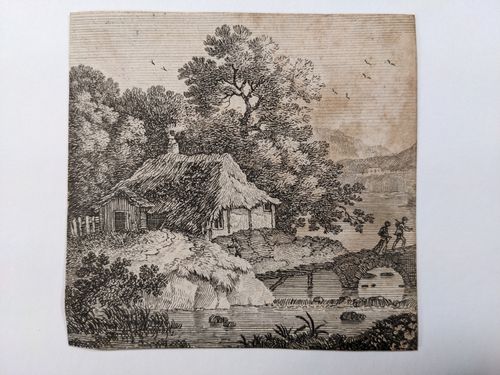 Two people crossing a bridge near a hut — Unknown